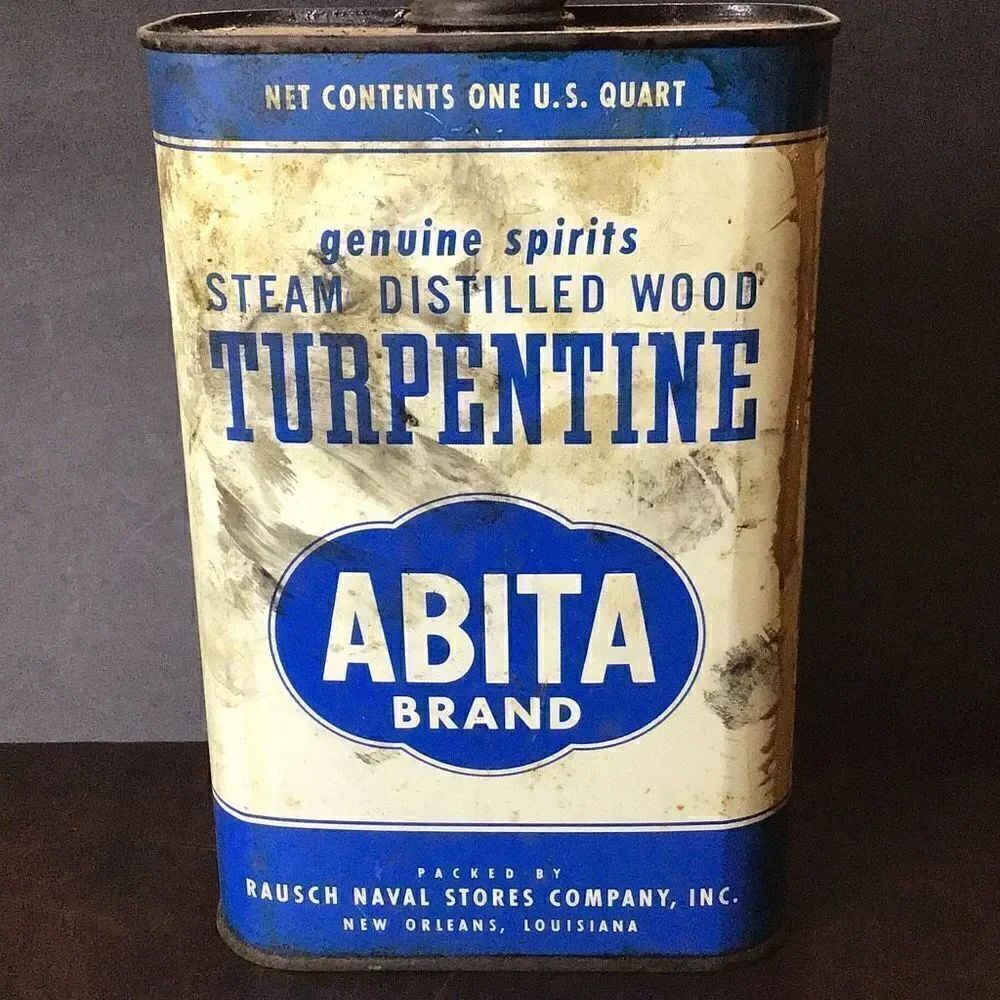 Vintage Abita brand turpentine bout half full